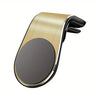 A sleek, gold-toned magnetic phone mount designed to attach to a car air vent.