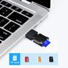 A close-up view of a silver USB-C to SD/TF card reader with a black keychain attachment and various memory cards.
