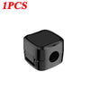 A single black magnetic cable clip designed for desk organization.