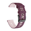 A purple silicone watch band for a smartwatch, shown in a curved shape.