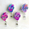 A set of colorful heart-shaped anatomical diagram badge reels featuring detailed illustrations of the human heart.