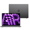 A close-up view of a purple MacBook Air with a protective case next to a gray laptop.