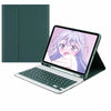 A green leather keyboard case with a detachable Bluetooth keyboard shown next to an iPad displaying anime art.