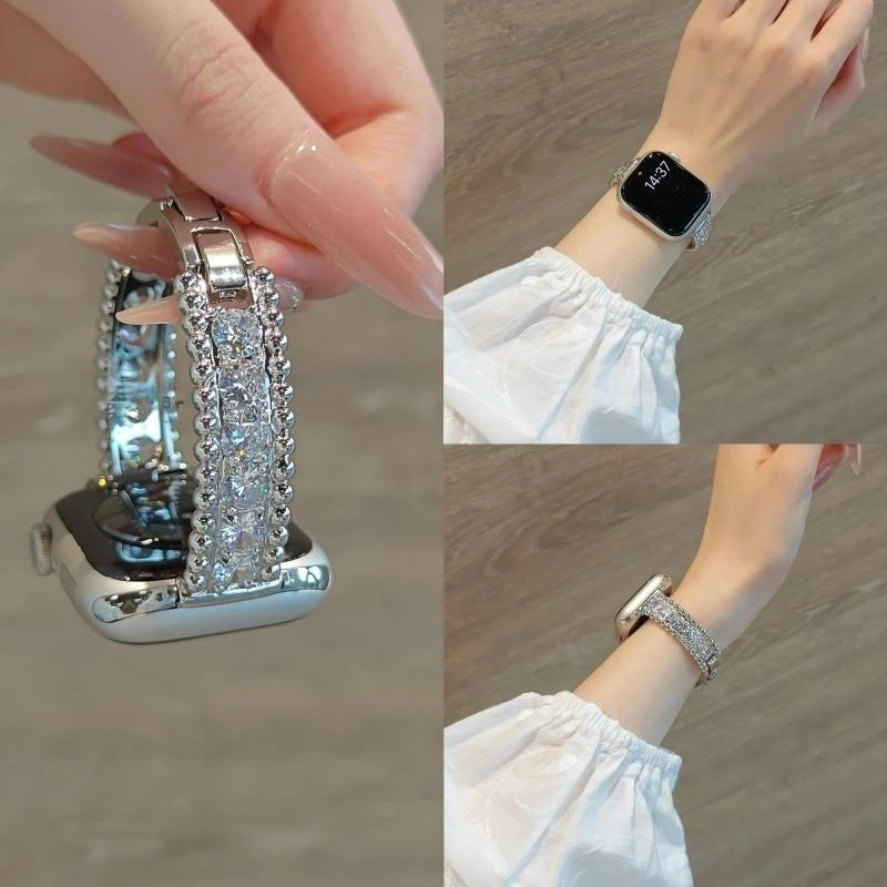 A close-up of a crystal-embellished watch strap with sparkling zircon accents shown on a hand and wrist.