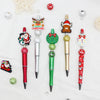 A set of decorative beaded ballpoint pens featuring Christmas and festive designs.