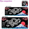 A black gaming desk mat featuring a detailed Japanese dragon and Mount Fuji design with pink cherry blossoms.