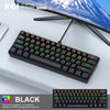 A black 61 key mechanical keyboard is shown on a white desk next to a computer monitor.
