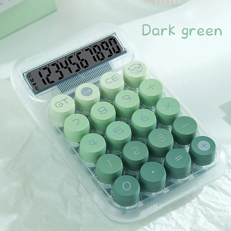 A clear plastic case containing various green buttons and a digital display for a Dopamine Gradient Calculator.