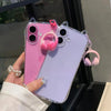 A pink iPhone is shown in a clear case with 3D cat ears and pink headphones attached.