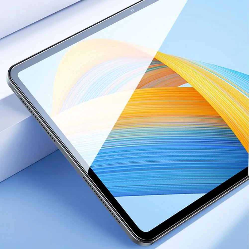 A tablet screen protector is shown with colorful light streaks on a blue background.