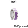 A roll of round assorted color dot labels for organization, containing 1000 pieces per roll.