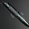 A black tactical aluminum pen is shown in profile with measurements indicating its length and diameter.