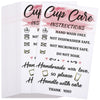 A set of pink and white instruction cards titled Cup Care Instructions detailing hand washing, dishwasher safety, microwave s