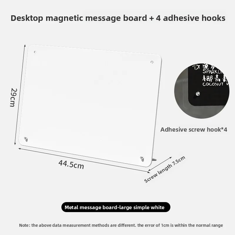 A white desktop magnetic message board with four adhesive hooks and a clear writing surface.