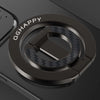 A close-up of a black MagSafe double-sided phone ring holder with a textured surface and a circular design.