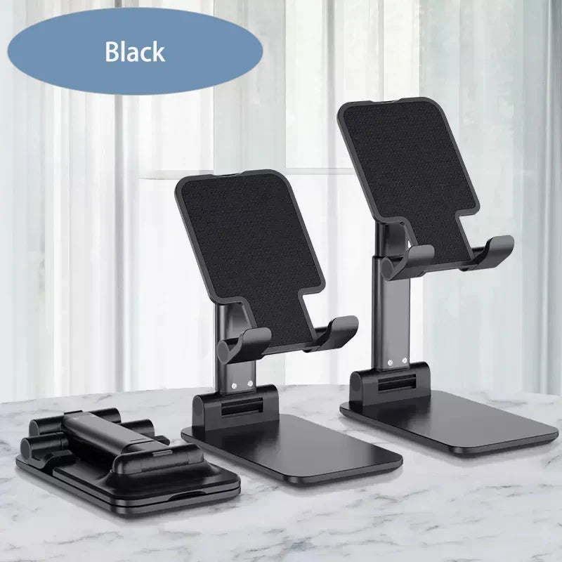 Black foldable adjustable phone holder stands displayed on a marble surface.