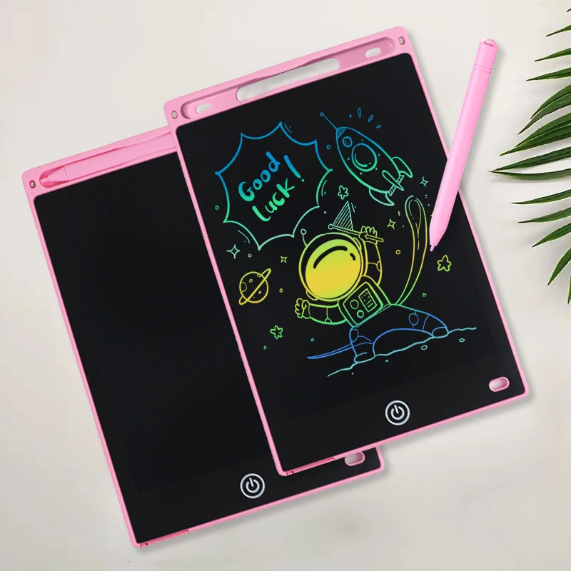 A pink portable LCD drawing tablet displaying a colorful space-themed drawing on a black screen.