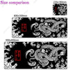 A black gaming desk mat featuring a detailed purple and white Japanese dragon design.