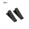 Two black ergonomic keyboard riser stands with anti-slip bases