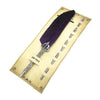 A set of retro calligraphy feather dip pens displayed on a parchment-like card.