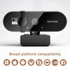 A black 2K webcam with an auto focus feature and microphone, shown on a white background.