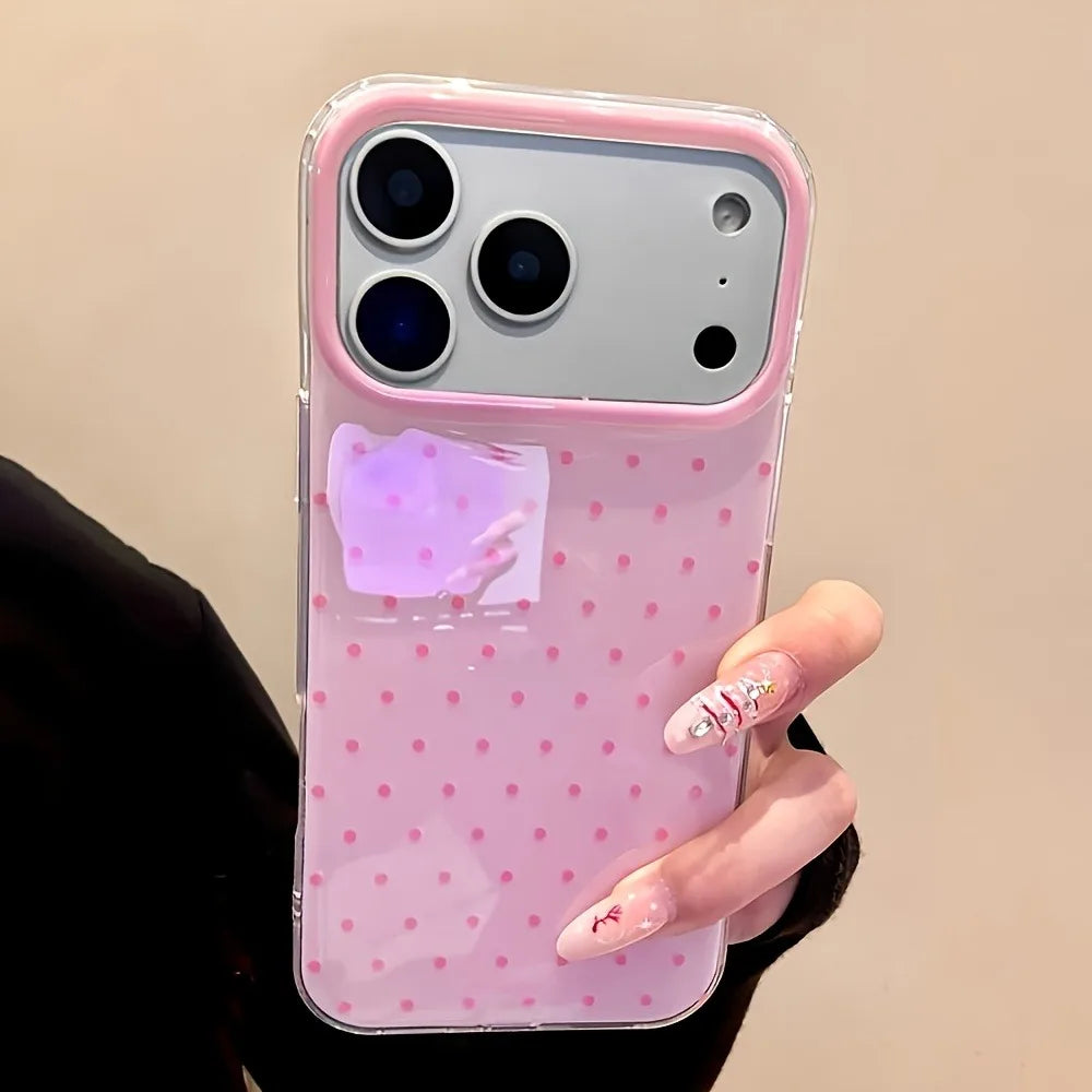 A pink minimalist polka dot shockproof phone case with a clear back and a light gray camera module.