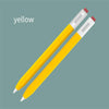 Un stylo jaune à pointe rouge sur fond gris.