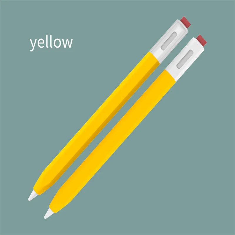 Un stylo jaune à pointe rouge sur fond gris.
