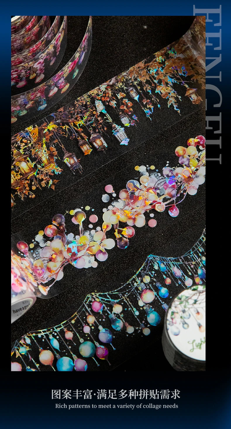 A close-up of decorative PET washi tape patterns featuring colorful lights and foliage on a black background.