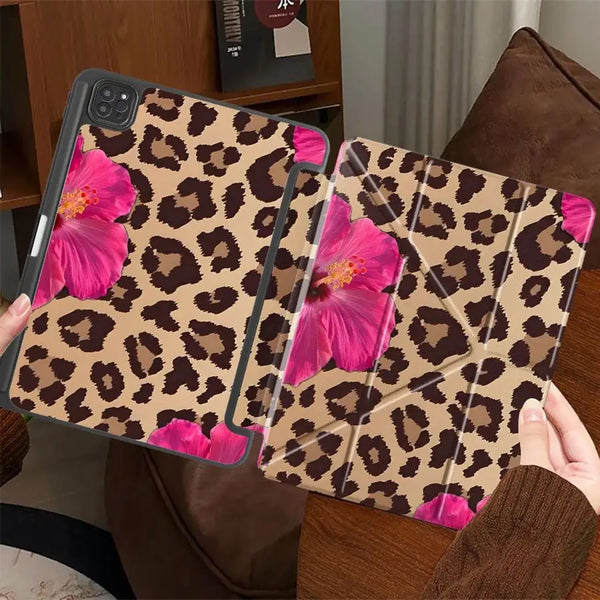 A clear protective case with a leopard print design featuring pink flowers is shown on an iPad.