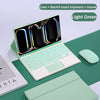 Light green magnetic keyboard case for an iPad Pro with a backlit touch keyboard and mouse.