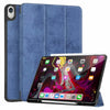 A purple retro marbling skin cover for an iPad Pro displayed next to its protective case.