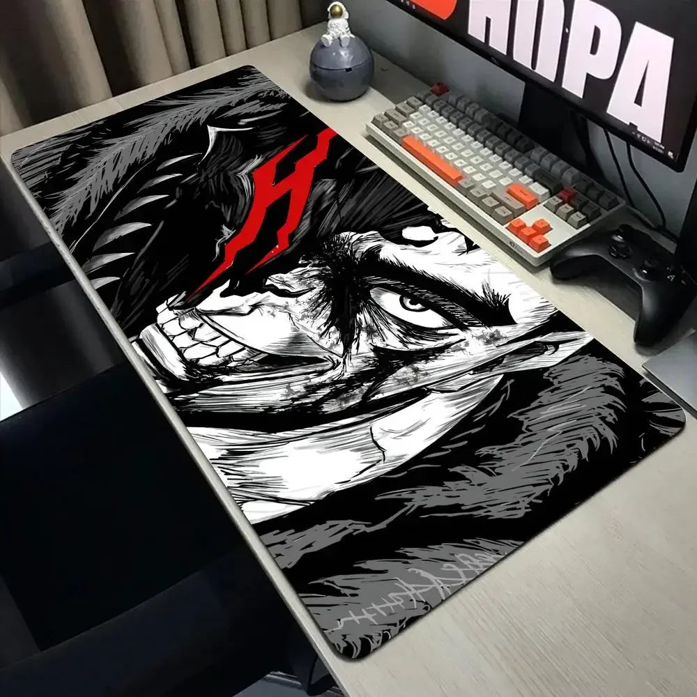 A large black and white anime design featuring a fierce face with red markings on a gaming mouse pad.