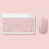 A white multi-device Bluetooth keyboard and mouse combo with a light pink background.