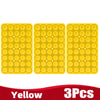Three yellow silicone suction cup phone holders