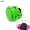 A bright green arcade push button with a black micro switch and gold-plated terminals.