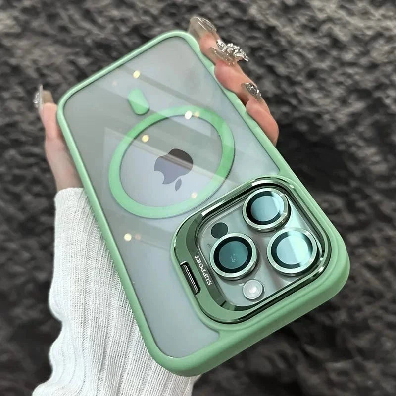 A hand holds a light green MagSafe-compatible phone case featuring a built-in camera bracket and lens cover.