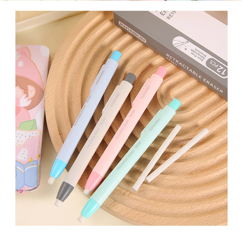 A set of twelve retractable pencil erasers in various pastel colors displayed on a wooden surface.
