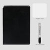 A black cover notebook with an erasable cloth and a dry-erase marker shown next to it.
