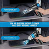 A hand uses a 2-in-1 air duster and vacuum cleaner to clean dust from a computer keyboard.