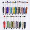A collection of 20 rhinestone beaded pen accessories in various colors and finishes.