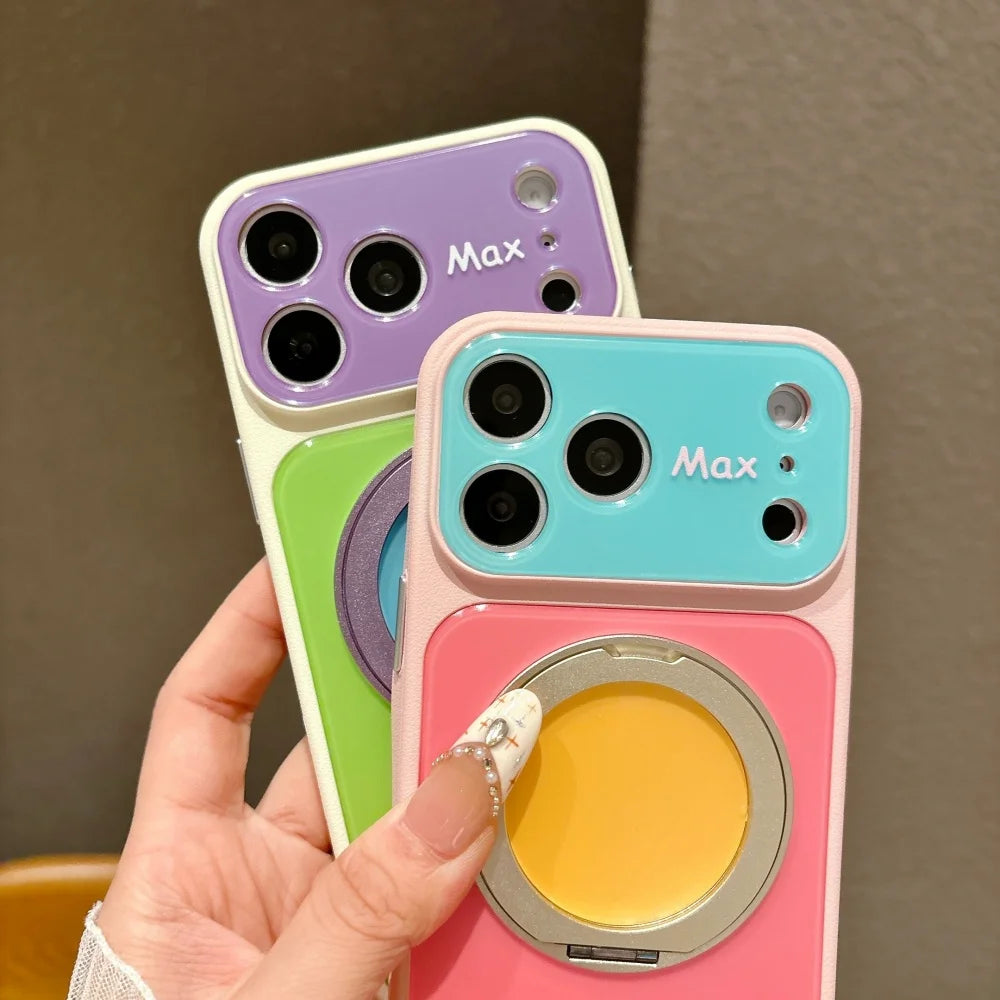 A hand holds a pink phone case with multiple camera lenses and a magnetic ring stand attachment.