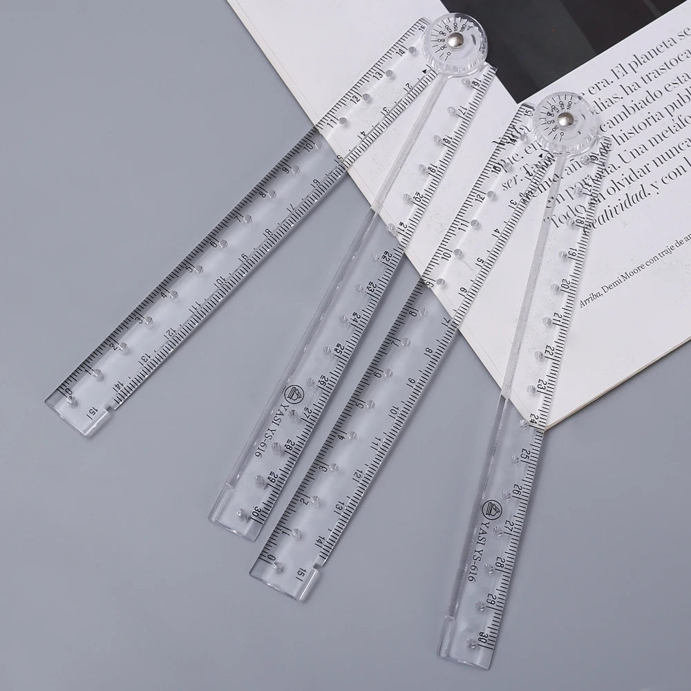 A set of clear acrylic geometry rulers with graduated markings and mounting points.