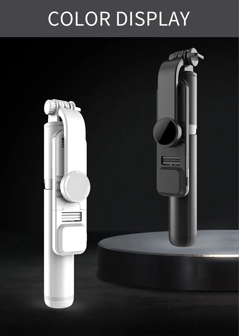 A white Bluetooth selfie stick with an LED fill light and tripod stand displayed against a dark background.