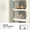 White tiered shelving unit displaying pairs of beige leather shoes and a diagram showing height specifications