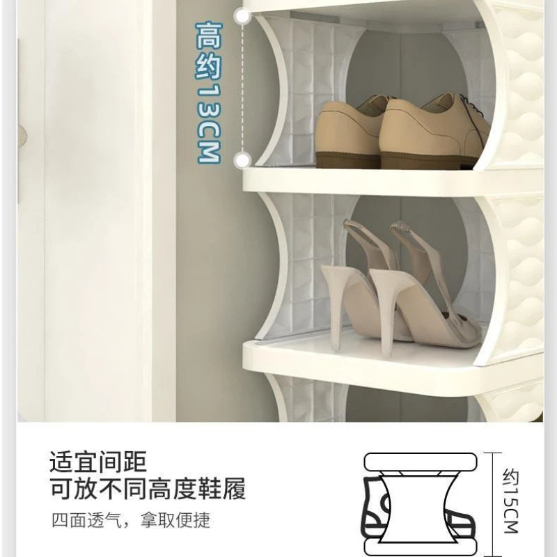 White tiered shelving unit displaying pairs of beige leather shoes and a diagram showing height specifications