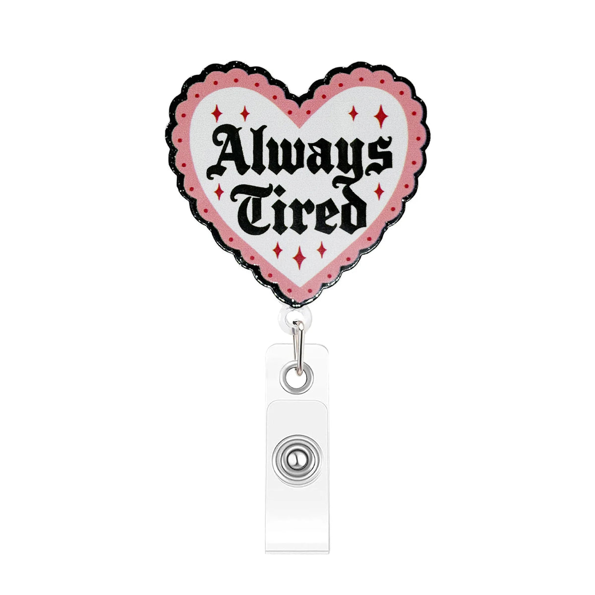 A heart-shaped badge reel with pink and white design featuring the text Always Tired