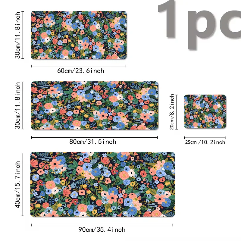 A collection of floral designs on various sized mouse pads with non-slip rubber bases.