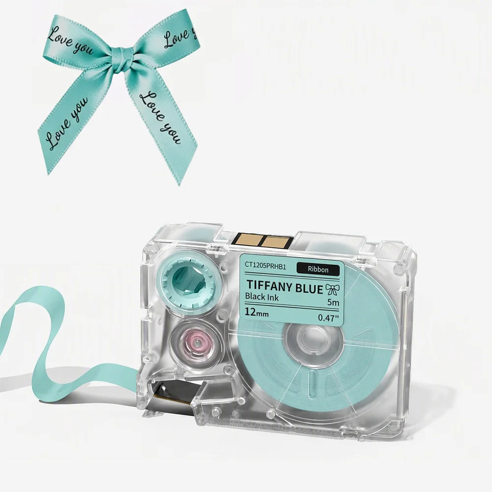 A clear label maker device with a blue ribbon and a blue sticker roll is shown on a white background.