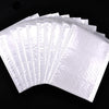 A fan of white self-sealing pearl film bubble shipping bags arranged in a semi-circle.